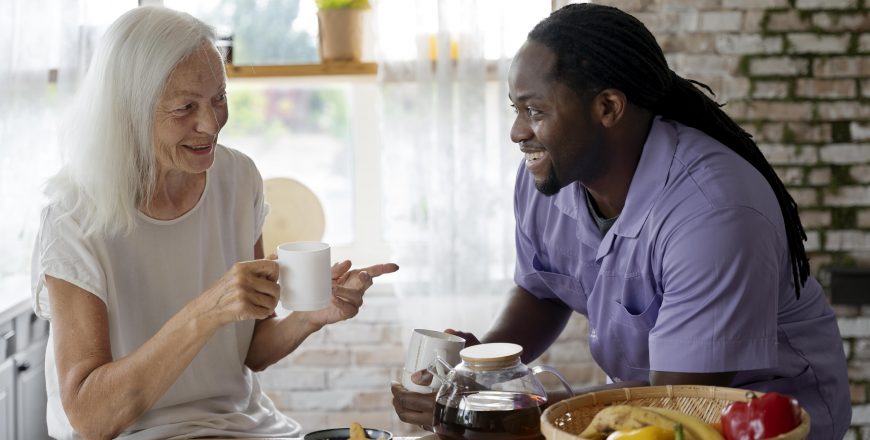 african-social-worker-helping-senior-woman